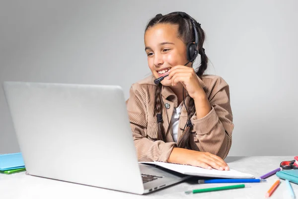 Portrait Little Girl Wireless Headset Using Laptop Studying Online Home — Stockfoto