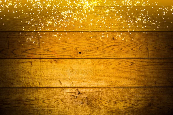 Placa Madeira Frente Luzes Grinalda Ouro Quente Natal Fundo Rústico — Fotografia de Stock