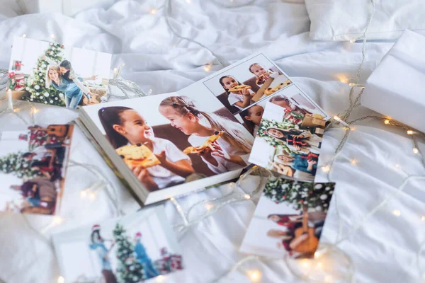 stock image Photos of children against Christmas lights background.