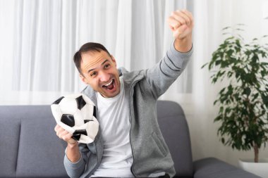 Fan Sport Player arka planda kutlama yapıyor. Yüksek kalite fotoğraf