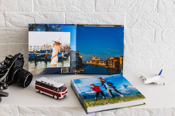 Photobook Album with Travel Photo with toy bus and plane. photo book.