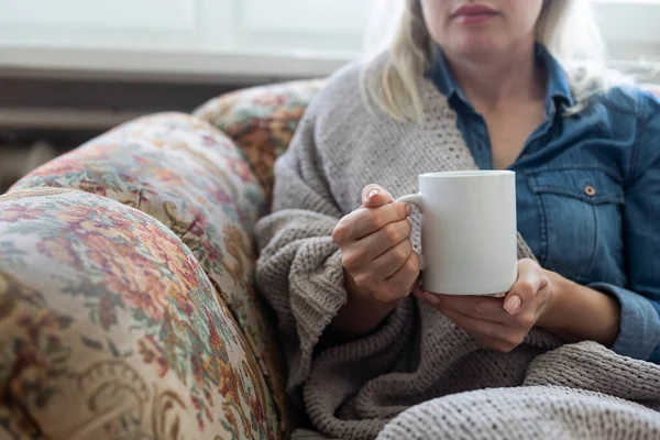 stock image warm cup of hot coffee warming in the hands of a girl