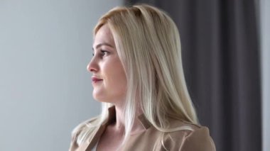 portrait beautiful woman smiling turns head looking at camera with happy emotion enjoying successful lifestyle