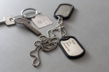 identity tag or dog tag key.