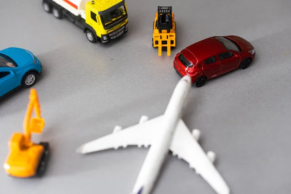 Travel concept. Toy model of car and airplane