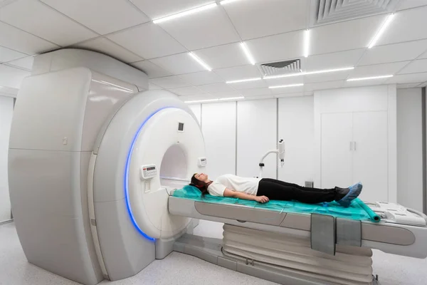 Medical CT or MRI Scan in the modern hospital laboratory. Interior of radiography department. Technologically advanced equipment in white room. Magnetic resonance diagnostics machine.