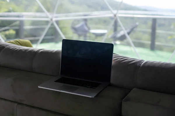 laptop in the dome camping.