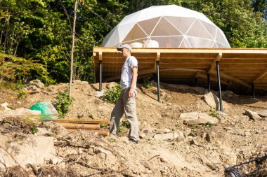 installation of domed on the ground, consisting of steel profiles and plastic.
