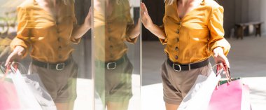 Alışveriş torbalarıyla yürüyen bir kadın, noel.