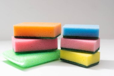 Multi-colored sponges for dishes Isolated on a white background