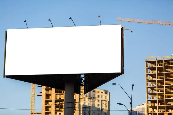 Blank billboard at blue sky background, mock up