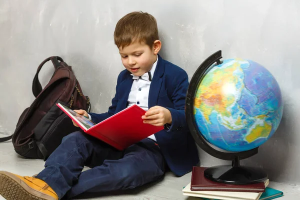 little student holding books, self-education
