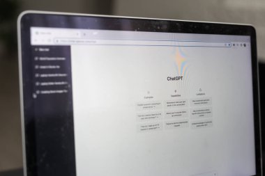 ChatGPT chat bot screen seen on smartphone and laptop display with Chat GPT login screen on the background. A new AI chatbot by OpenAI. Kyiv, Ukraine - February 06, 2023. High quality photo