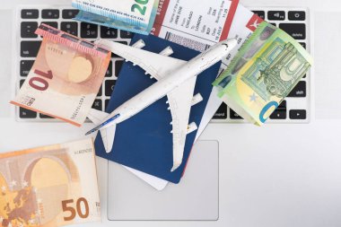 Take your work to new heights with a plane laptop Stay connected and productive while traveling, perfect for busy professionals and digital nomads