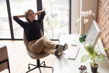 Searching for new solution. a woman with a computer.