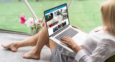 automobile sales center, Laptop screen displaying a car sale concept.