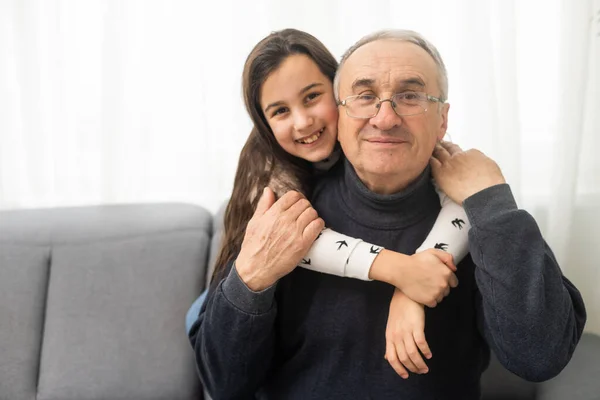 Family Time Pretty Granddaughter Hugging Her Grandfather — Stock Photo, Image