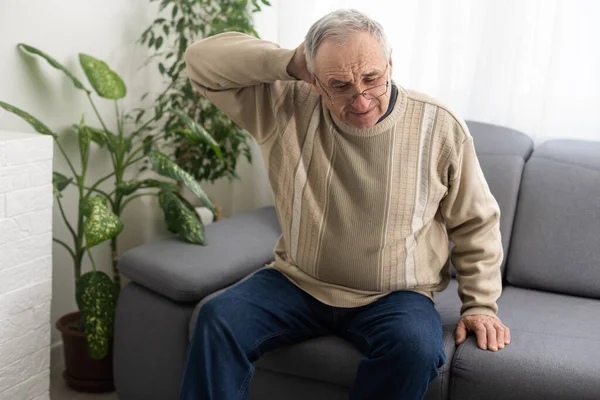 Senior Man Having Headache Touching His Head While Suffering Migraine — Stock Photo, Image