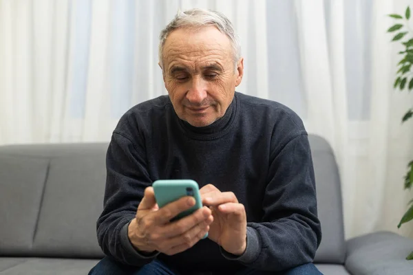 Bad News Concept Upset Mature Man Holding Smartphone Looking Mobile — Stok fotoğraf