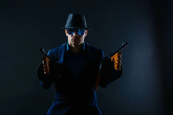 Mature Business Man Holding Gun Dark Background — Stok fotoğraf