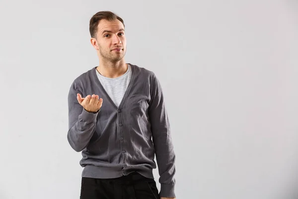 Confident Stylish Young Man Looking Camera While Standing White Background — Φωτογραφία Αρχείου