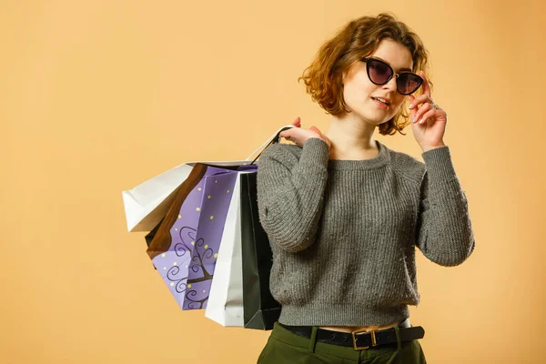 Portrait Excited Beautiful Girl Wearing Sunglasses Holding Shopping Bags Isolated — Stock Photo, Image