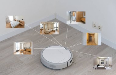 İnsanlar, ev işleri ve teknoloji konsepti. Robot elektrik süpürgesi