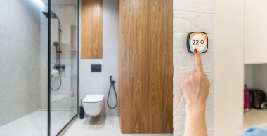 Termostat, ev sisteminde sıcaklığı ölçmek için akıllı bir ev. Kış ısıtma enerjisi verimli otomasyon dijital dokunmatik el dokunmatik cihazı oturma odasındaki ısıtmayı ayarlamak için. IOT domotikleri.