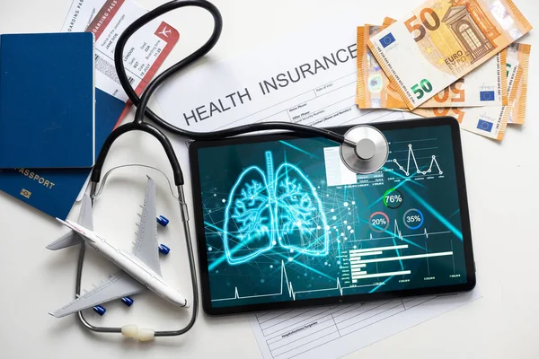 Health insurance, health conceptual, tablet, stethoscope.