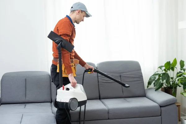 Process of deep furniture cleaning, removing dirt from sofa. Washing concept