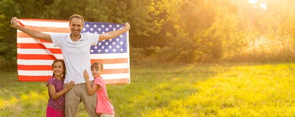 Patriotic Holiday Happy Family Mother Daughters American Flag Outdoors Sunset — Stock Photo, Image