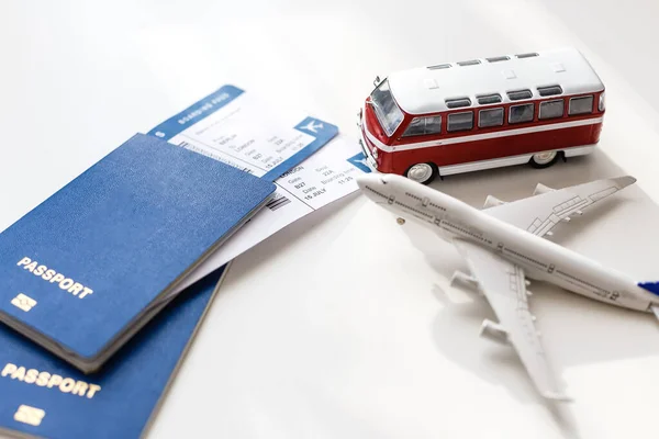 passports, toy bus, tickets. Travel concept.