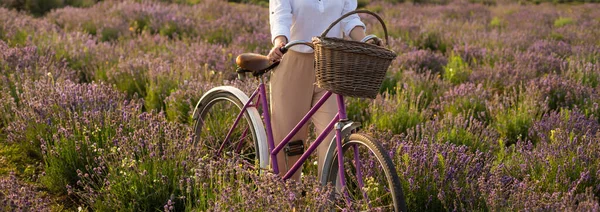 Beautiful woman on the lavender field.