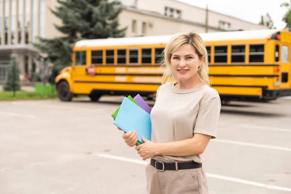 Portrait Cheerful Teacher Standing School Bus — Stock fotografie