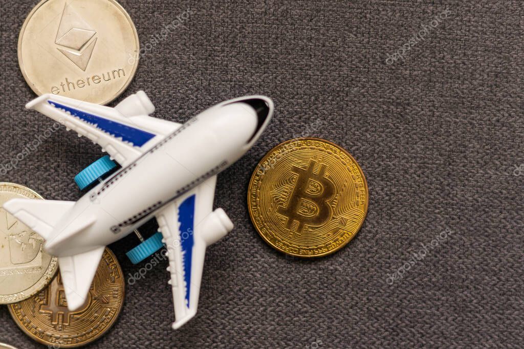 Bitcoin with aeroplane, passport. Cryptocurrency Business concept