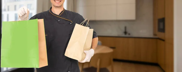 Young Handsome Man Holding Delivery Paper Bag — Stock Photo, Image