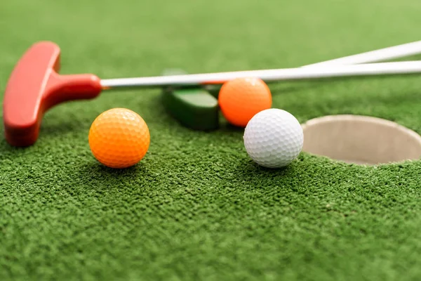 Mini Golf Clubs Balls Different Colors Laid Artificial Grass — Stok fotoğraf