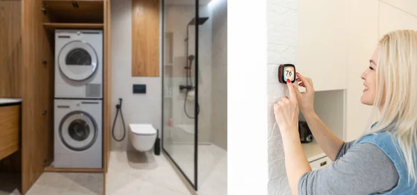 Smiling Indian woman using modern smart home system, controller on wall, positive attractive young female switching temperature on thermostat or activating security alarm in apartment