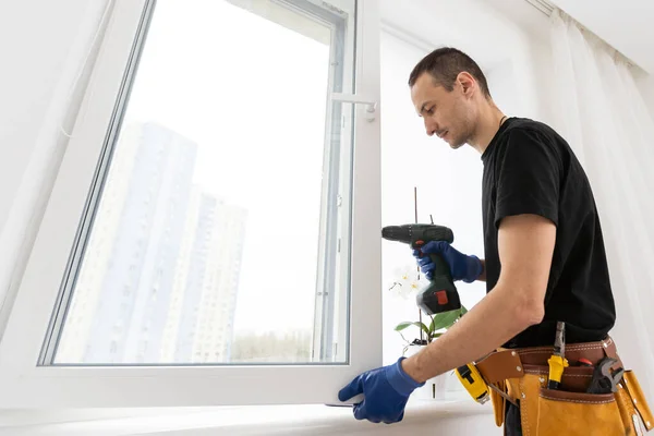 Worker Adjusting Installed Window Screwdriver Indoors Closeup High Quality Photo — Stock Photo, Image
