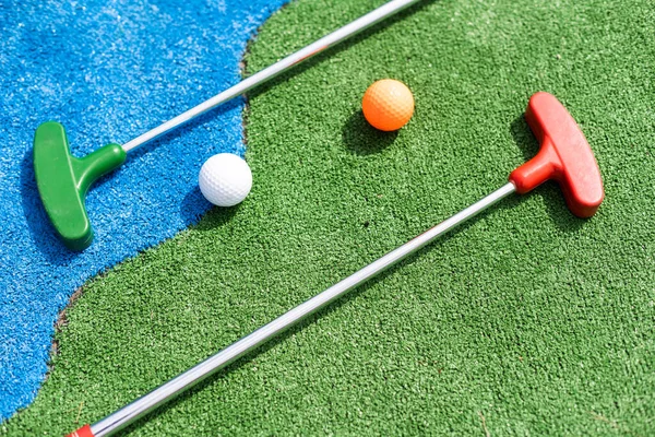 Mini Golf Clubs Balls Different Colors Laid Artificial Grass — 图库照片