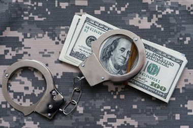 military uniform and handcuffs, money clipart