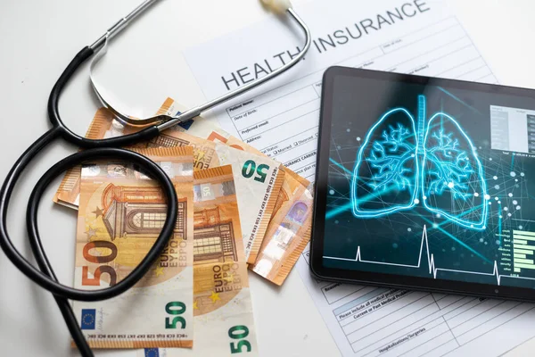 Health Insurance Online Application Form on screen tablet pc, health concept. Information technology and mobile application in healthcare. medical