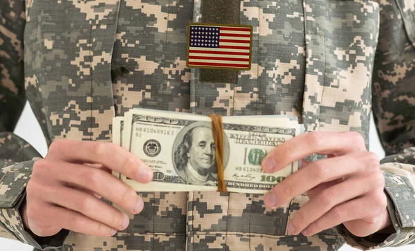 American military man with money.