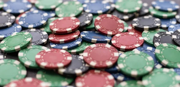 stock image Plastic casino chips background. Poker game.