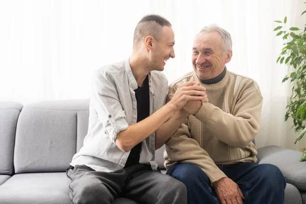 Young Adult Caucasian Son Listening Supporting His Old Elderly Senior —  Fotos de Stock