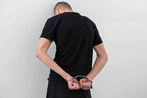 Mens Hands Closed Chrome Handcuffs — Stock Photo, Image
