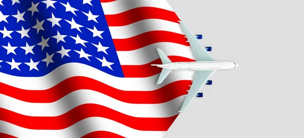グレーの背景にアメリカ国旗のおもちゃの飛行機 トップ表示 — ストック写真