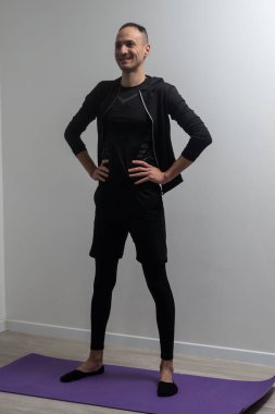 Full-length shot of male doing yoga