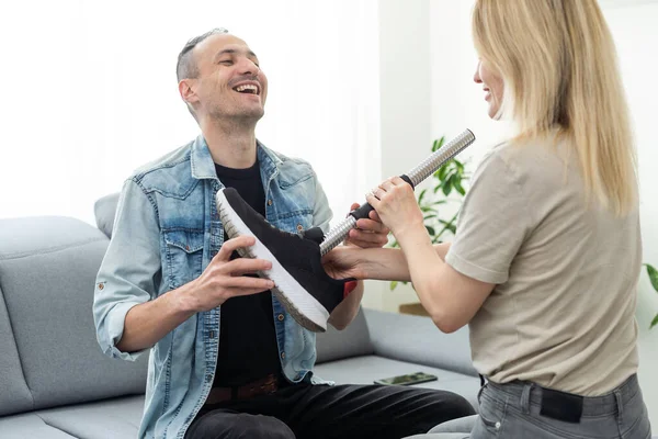 stock image Female technician assembling and fixing parts of modern prosthetic leg. High quality photo