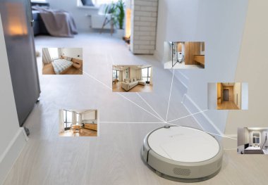 İnsanlar, ev işleri ve teknoloji konsepti. Robot elektrik süpürgesi